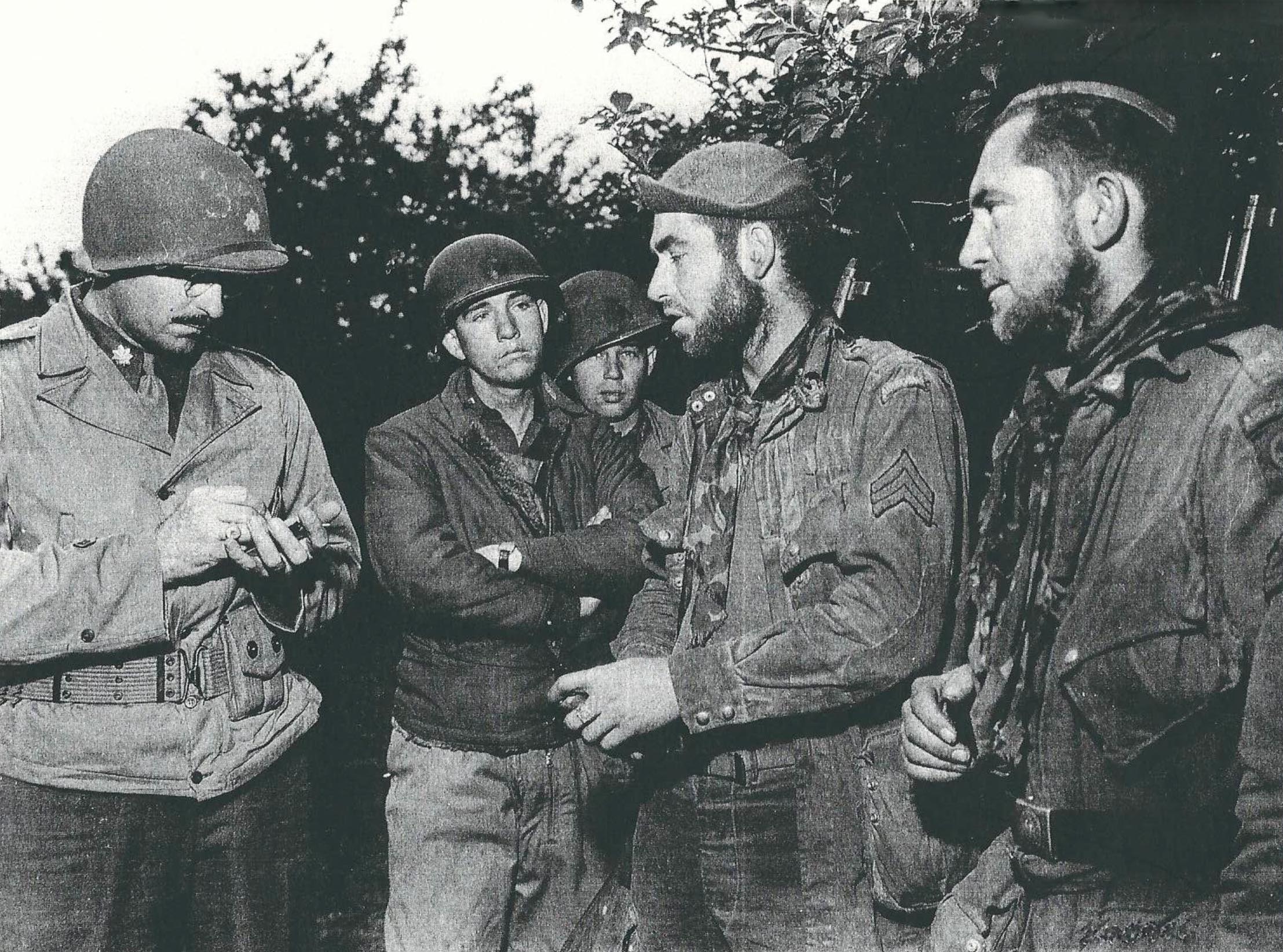 Sgt Haverill Lazenby (left) after escape in Normandy.